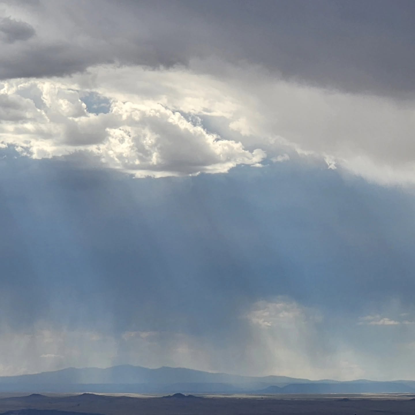 New Mexico storm clouds with dramatic light rays